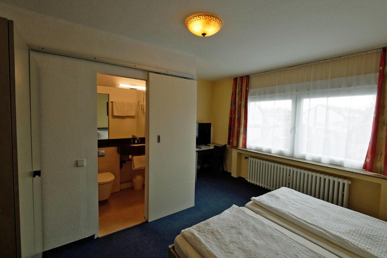 Hotel Wiedenhof ฮิลเดน ภายนอก รูปภาพ